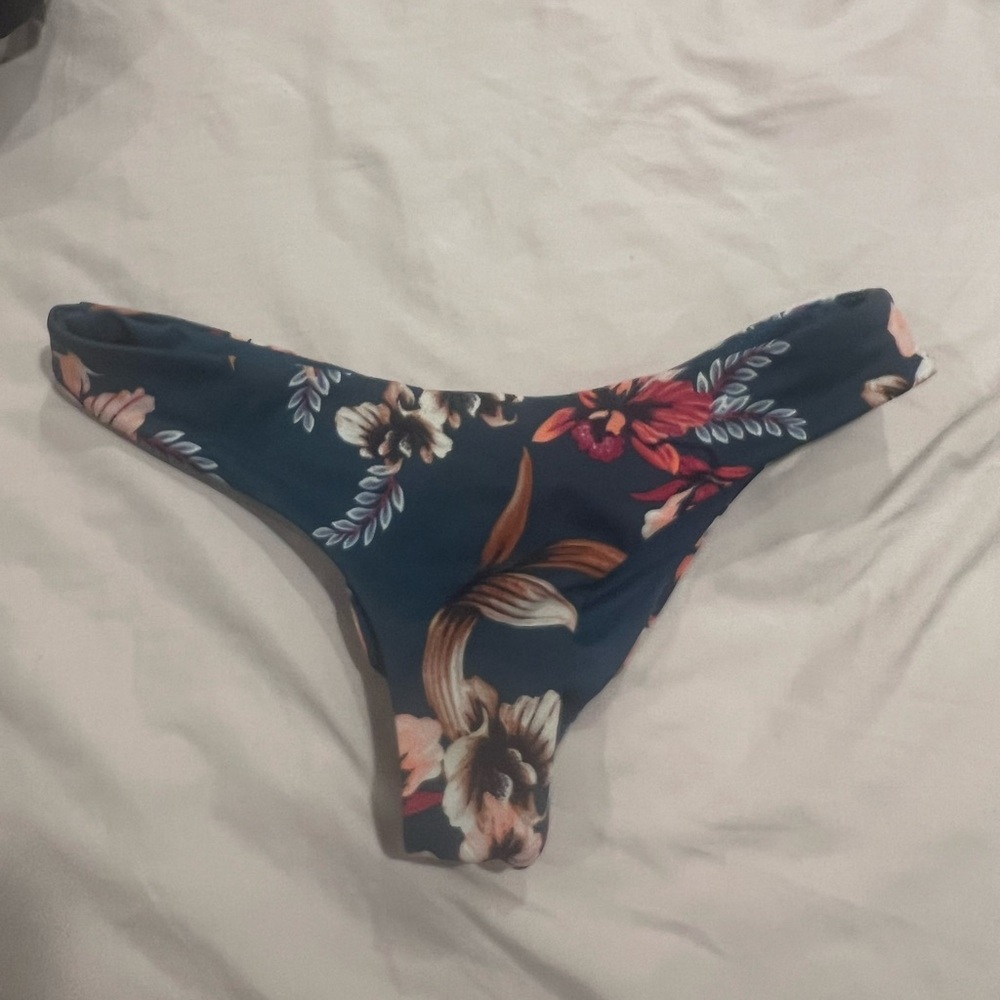 Tori Praver Blue and Red Bikini with Tropical Floral Design